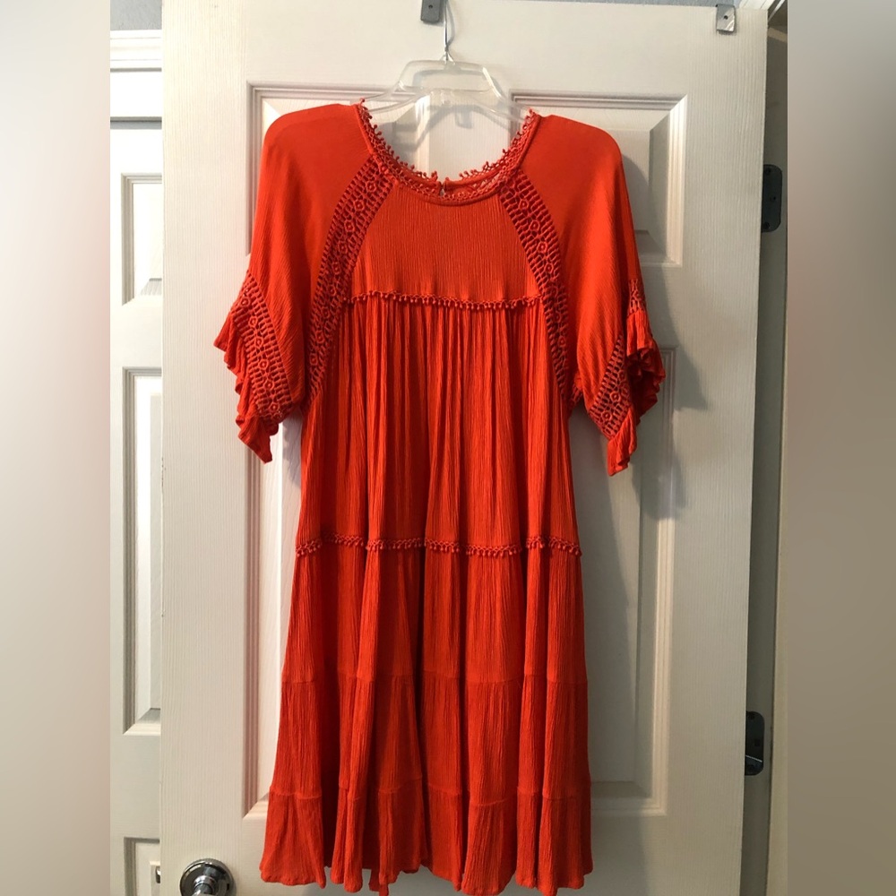 Fun  and flirty short dress for a cover up or going on vacation.